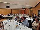 Attendees sitting at tables at the banquet