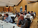 Attendees sitting at tables at the banquet