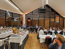 Attendees sitting at tables at the banquet