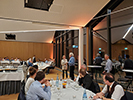 Attendees sitting at tables at the banquet