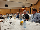 Attendees sitting at tables at the banquet