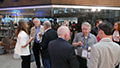 workshop attendees eating and listening to speakers at the banquet