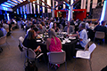 workshop attendees eating and listening to speakers at the banquet