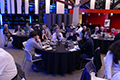 workshop attendees eating and listening to speakers at the banquet