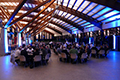 workshop attendees eating and listening to speakers at the banquet