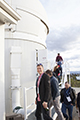 attendees taking a tour of Mount Stromlo Observatory