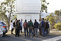 attendees taking a tour of Mount Stromlo Observatory