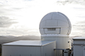 attendees taking a tour of Mount Stromlo Observatory