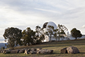 attendees taking a tour of Mount Stromlo Observatory