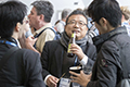 attendees and speakers at the Welcome address and reception