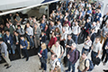 attendees and speakers at the Welcome address and reception