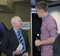 attendees and speakers at the Welcome address and reception