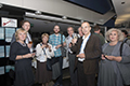 attendees and speakers at the Welcome address and reception